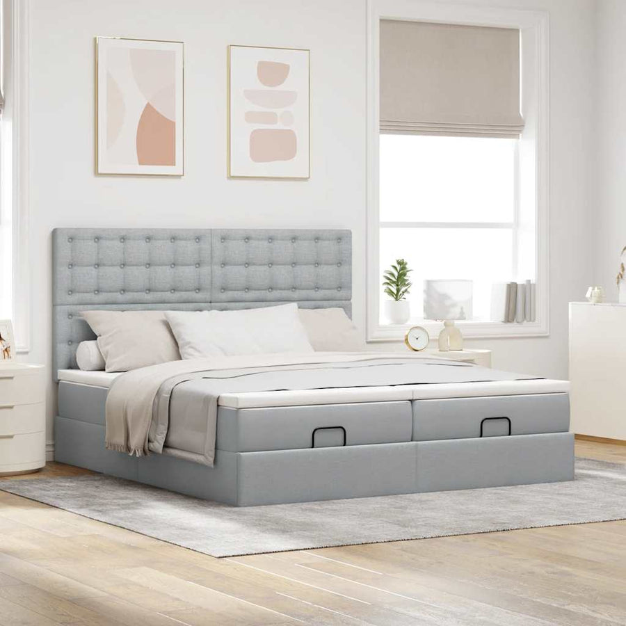 Ottoman bed met matrassen en LED's 200x200cm stof lichtgrijs