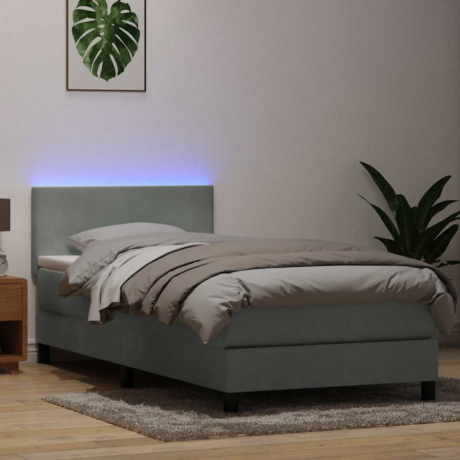 Boxspring met matras en LED fluweel lichtgrijs 90x220 cm