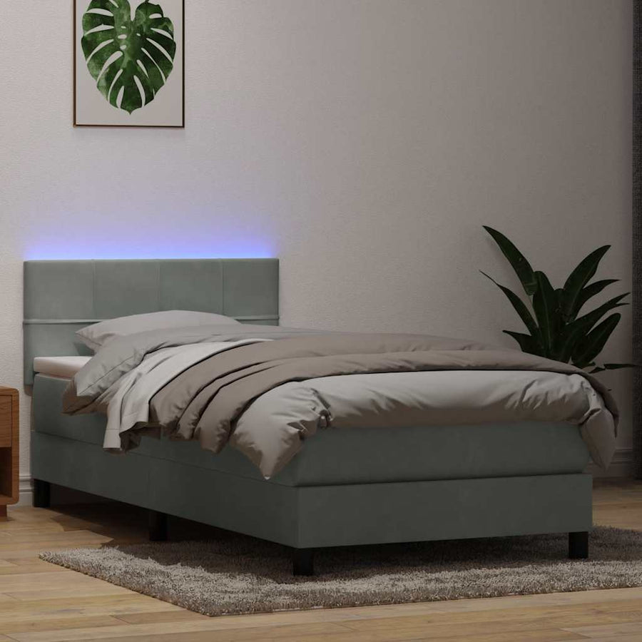 Boxspring met matras en LED fluweel lichtgrijs 80x210 cm