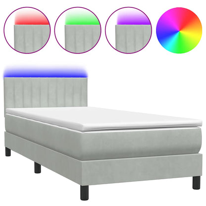 Boxspring met matras en LED fluweel lichtgrijs 90x220 cm