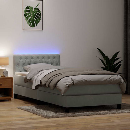 Boxspring met matras en LED fluweel lichtgrijs 90x220 cm