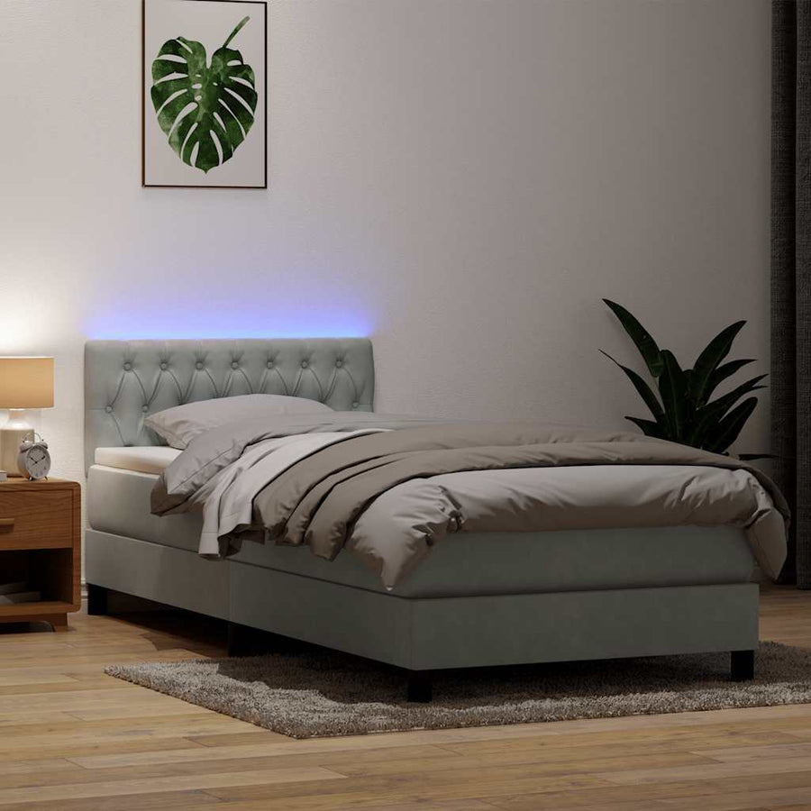 Boxspring met matras en LED fluweel lichtgrijs 90x220 cm