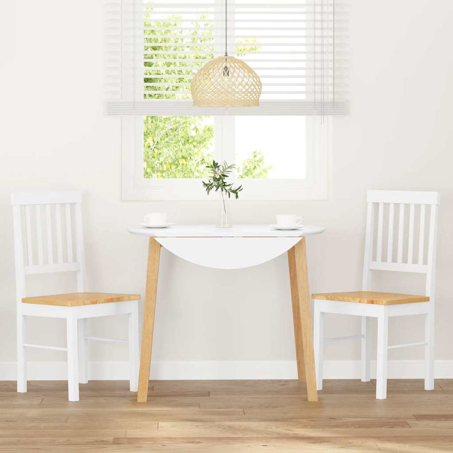Eetkamerstoelen met kussens 2 st massief hout rubber wit