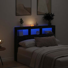 Hoofdbordkast met LED 140x17x102 cm zwart eikenkleurig