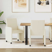 Eetkamerstoelen 2 stuks crème kunstleer met wieltjes