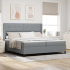 Boxspring bed met LED lichtgrijs 200x200 cm stof
