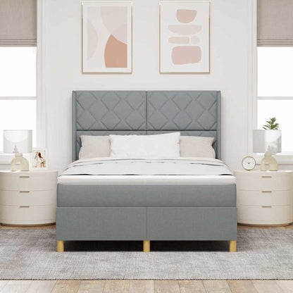 Boxspringbed met hoofdeinde Lichtgrijs 140 x 200 cm Stof