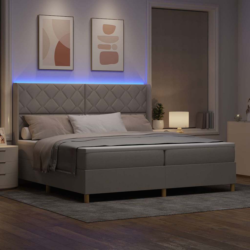 Boxspringbed met LED-stripverlichting Taupe 200 x 200 cm Stof