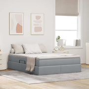 Opbergbed 140x200 cm lichtgrijs polyester met matras