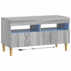 Tv-meubel grijs bewerkt hout 135x30x40 cm