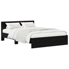 Bedframe met hoofdeinde zwart eiken 140x200 cm