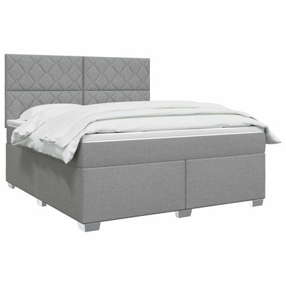 Boxspringbed met matras Lichtgrijs 140 x 190 cm Stof