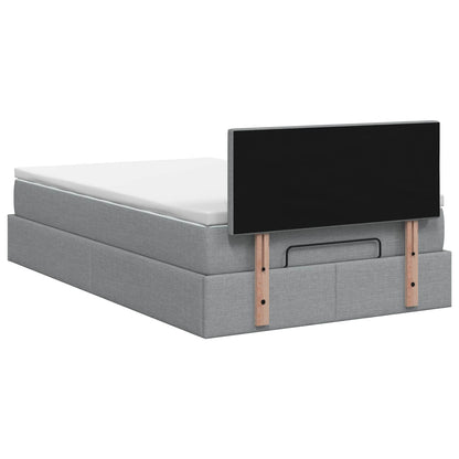 Ottoman Bed met Matrassen en LED Lichtgrijs 120 x 200 cm Stof