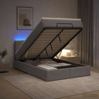 Ottomanbed 120x200 cm lichtgrijs met matras en LED