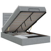 Ottoman bed met matras lichtgrijs 120x190 cm stof