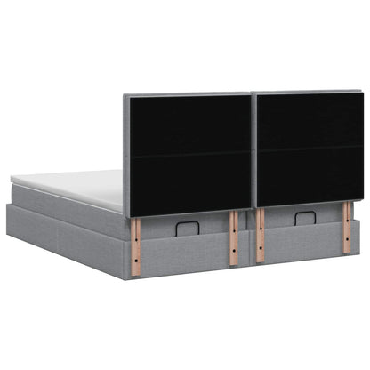 Ottoman bed met matras met hoofdeinde 2 st Lichtgrijs Stof