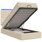 Ottoman bed 90x190 cm stof crèmekleurig met LED en matras