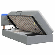 Opslagbed met LED en matras 90x190 cm lichtgrijs