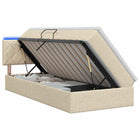 Opslagbed met LED en matras 90x200 cm crèmekleurig