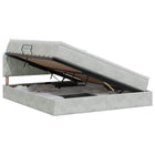 Opslagbed met LED 180x200 cm lichtgrijs fluweel