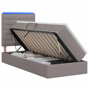 Opslagbed 90x200 cm taupe met LED en matras