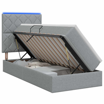LED Opslagbed met Matras Lichtgrijs 90 x 190 cm Stof