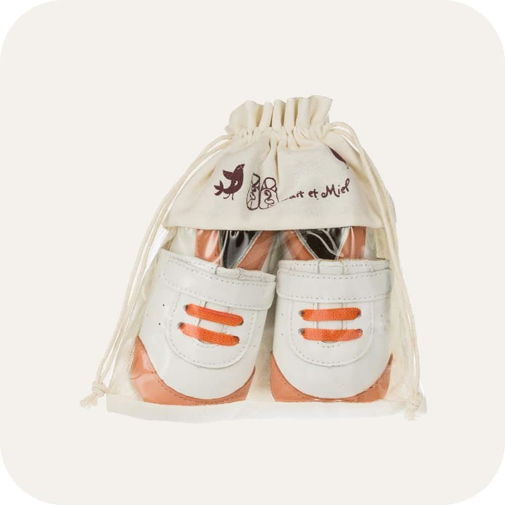 Babyslofjes sneaker wit oranje leer