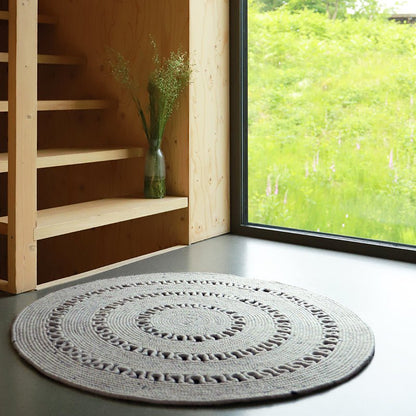 Round open-worked felted wool rug BIBEK GREY S