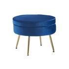 Round pouf made of dark blue velvet