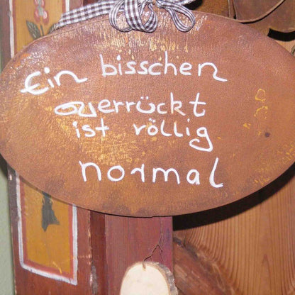 Decorative sign "A little crazy is perfectly normal"
