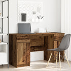 Bureau 140x49x76 cm bewerkt hout
