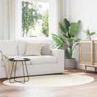 Vloerkleed crème ovaal 120x170 cm wol