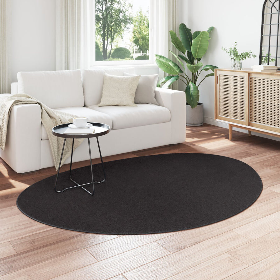 Vloerkleed ""Huarte"" Kortpolig Zacht En Wasbaar Zwart 140 x 200 cm Ovaal-Asymmetrisch
