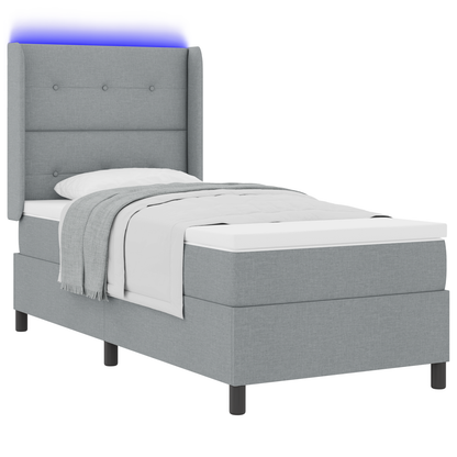 Boxspringbed met matras en LED stof lichtgrijs 90x190 cm