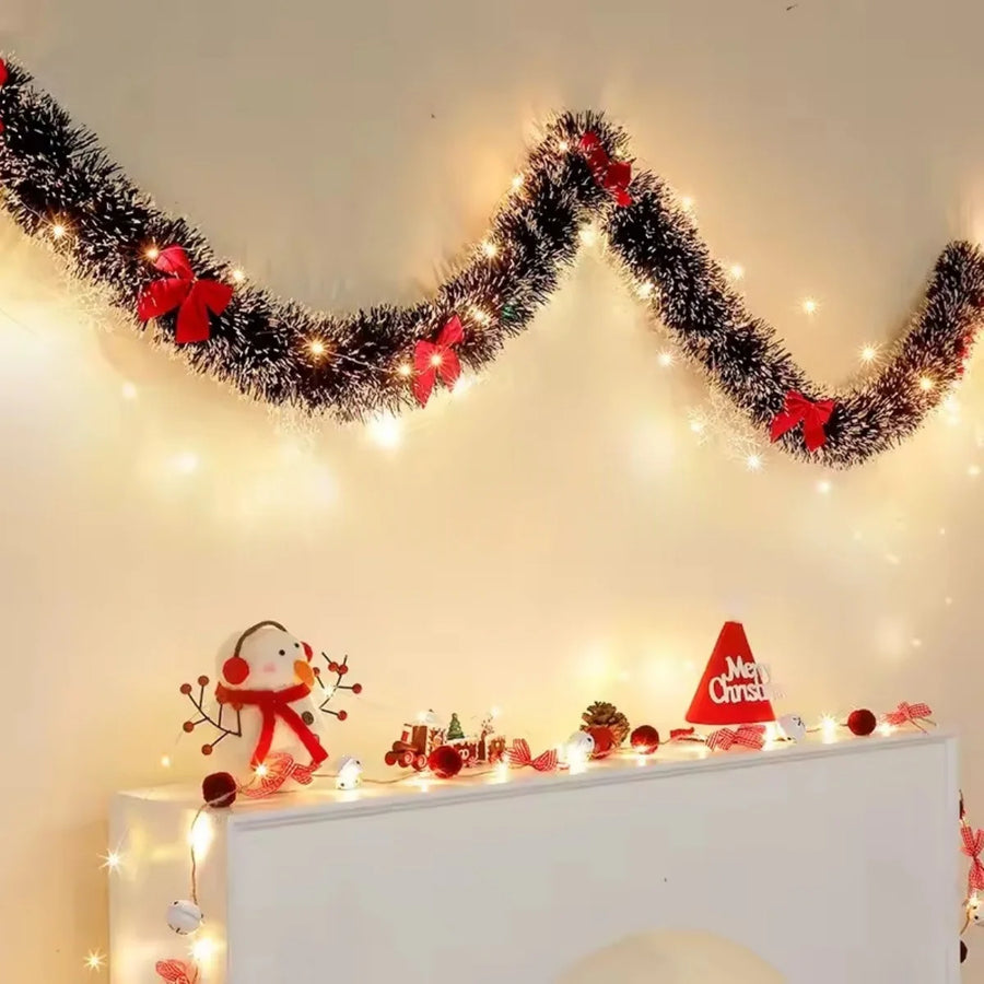 Kerstslinger groen tinsel met strikjes