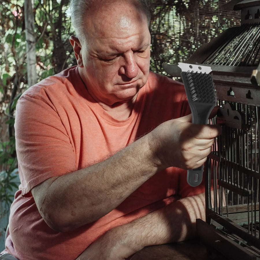 Vogelkooiborstel met lange steel en RVS schraper