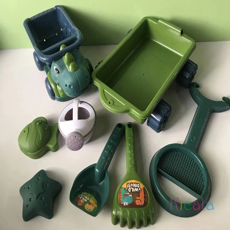 Zandspeelset dinosaurus met dumptruck schep hark gieter vormpjes