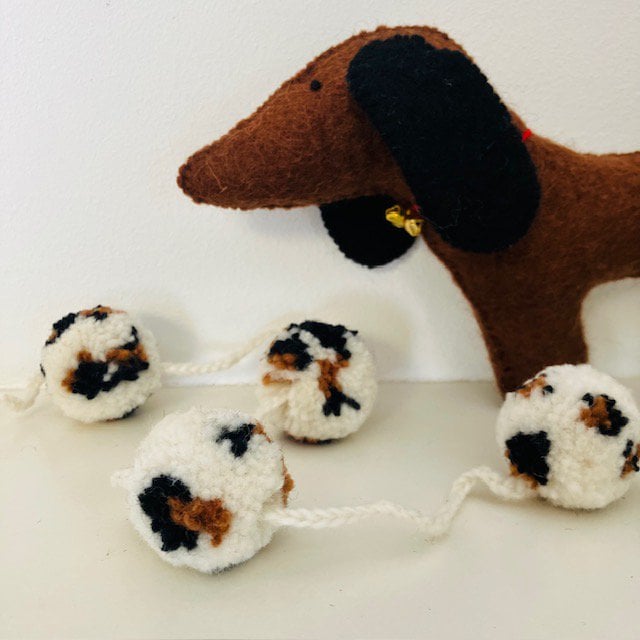 Slinger pompom luipaard off-wit 2m wol