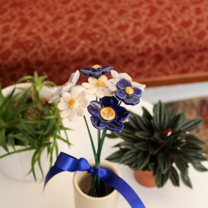 Keramiek boeket 8 bloemen blauw