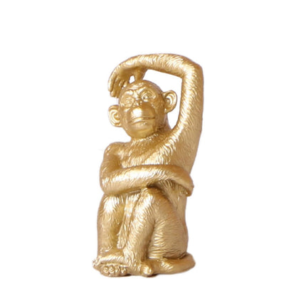 Beeldje aapje polystone 13 cm goud bruin zwart