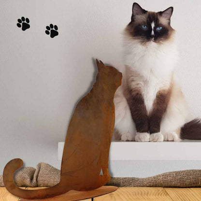 Metal decorative cat figurine with a patina finish