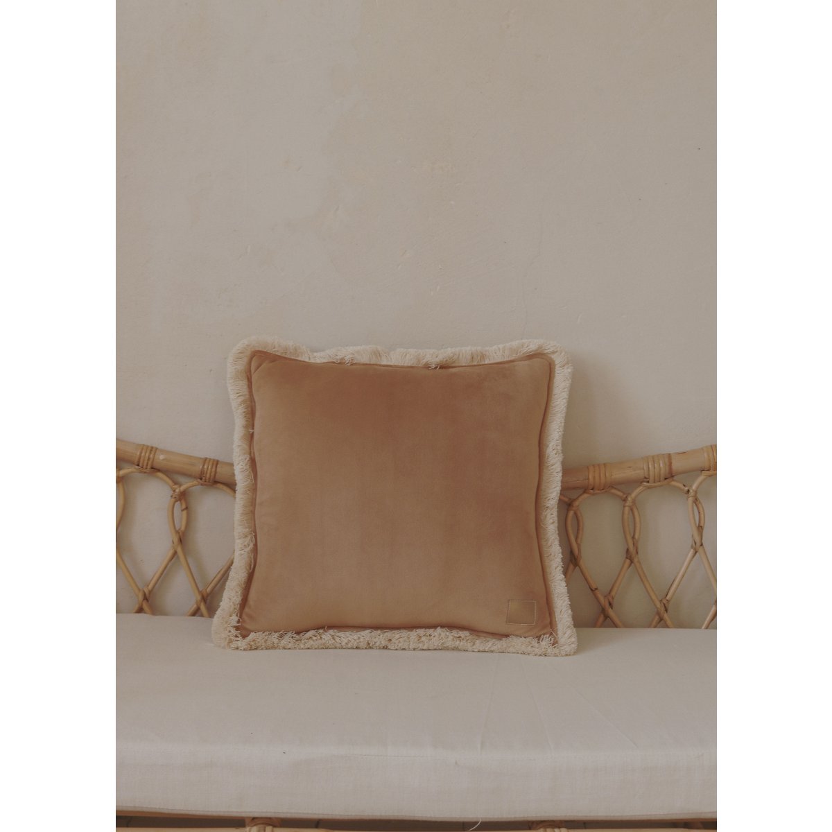 Soft velvet cushion "Caramel" with fringes