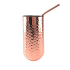 Cocktail glass with copper straw