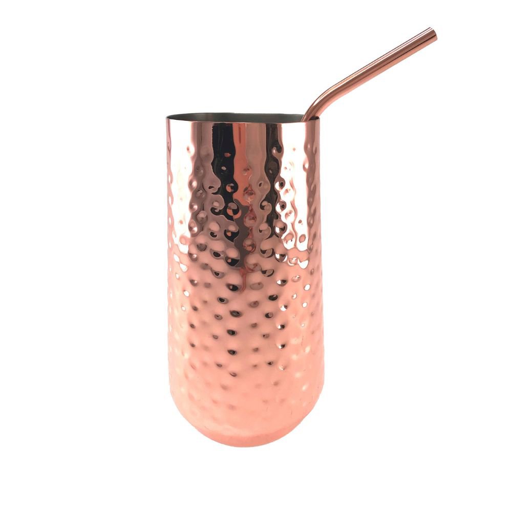 Cocktail glass with copper straw
