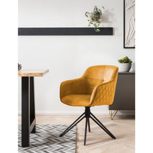 Armchair with yellow honeycomb quilt