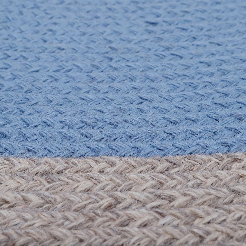NOLAN BLAUW kindervloerkleed van gevlochten wol