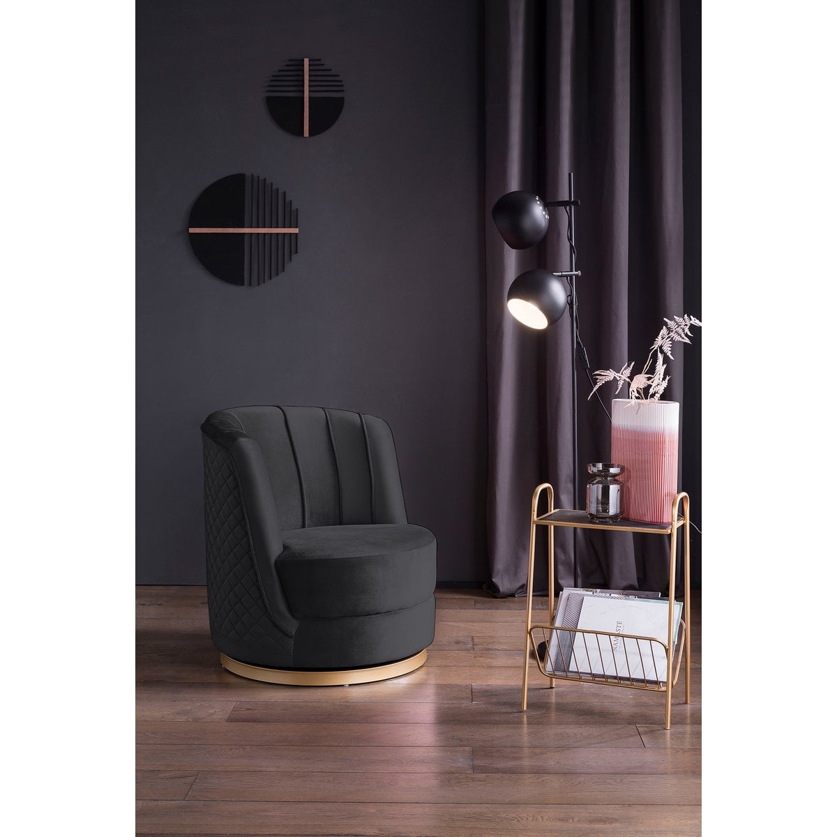 Black velvet swivel armchair