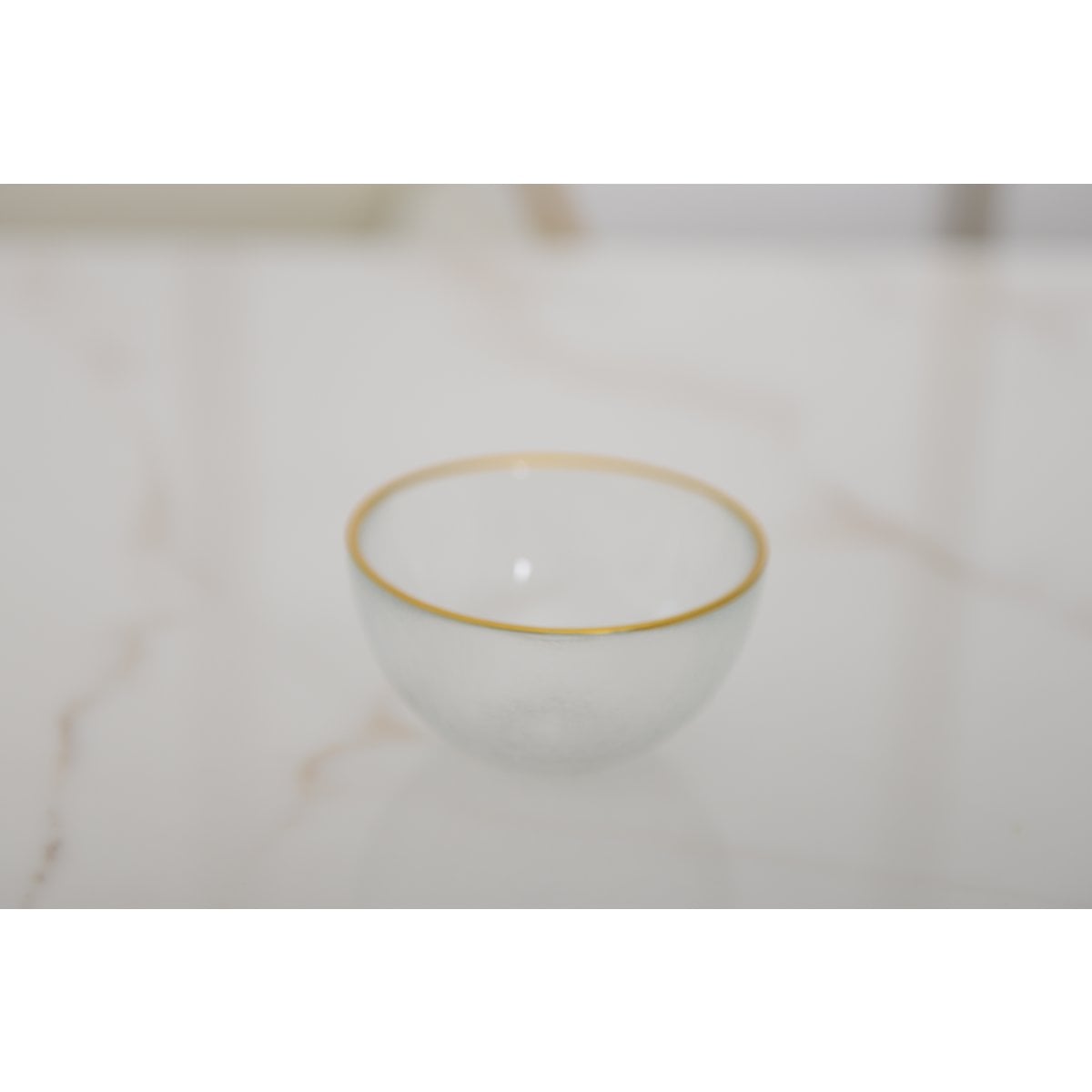 Glazen kom 9x9x3 cm goud