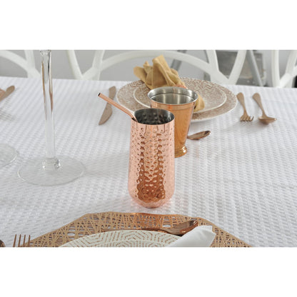 Cocktail glass with copper straw