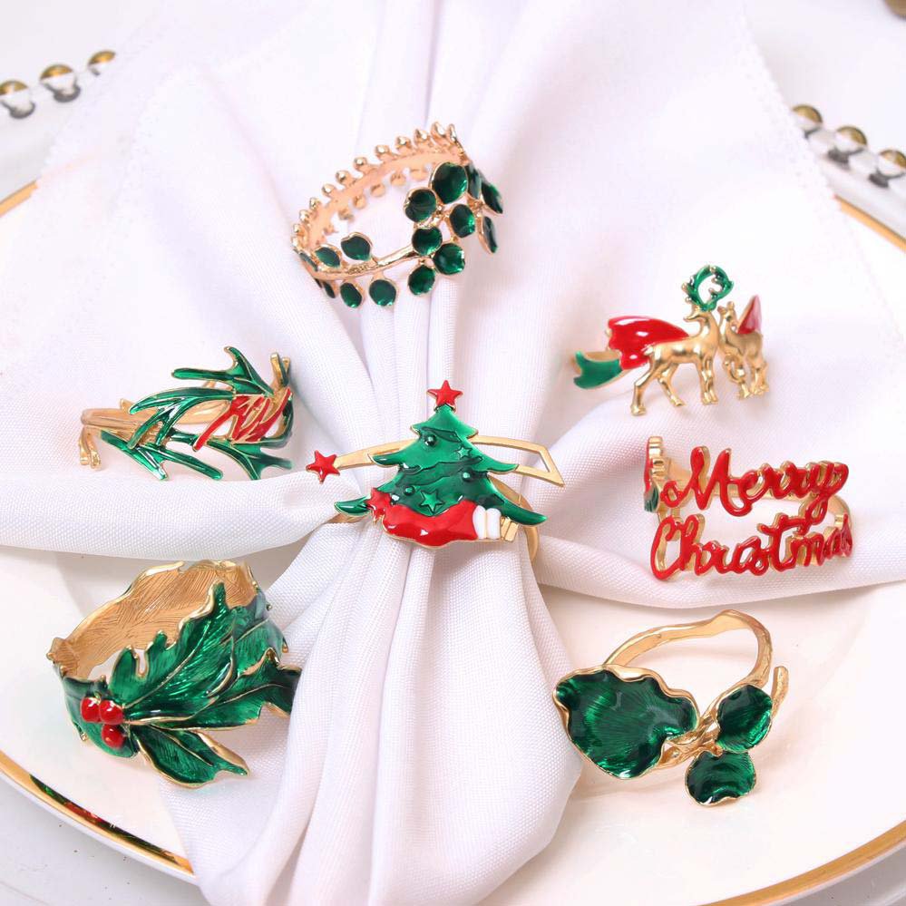 Set of 4 round gold towels with green diamonds